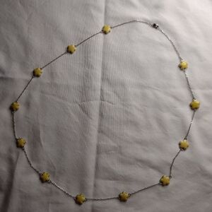 Long silver chain with yellow flowers